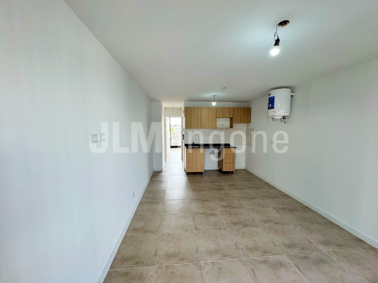 Departamento 2 ambientes con cochera y balcon