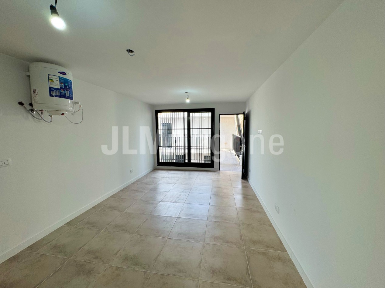 Departamento 2 ambientes con cochera y balcon