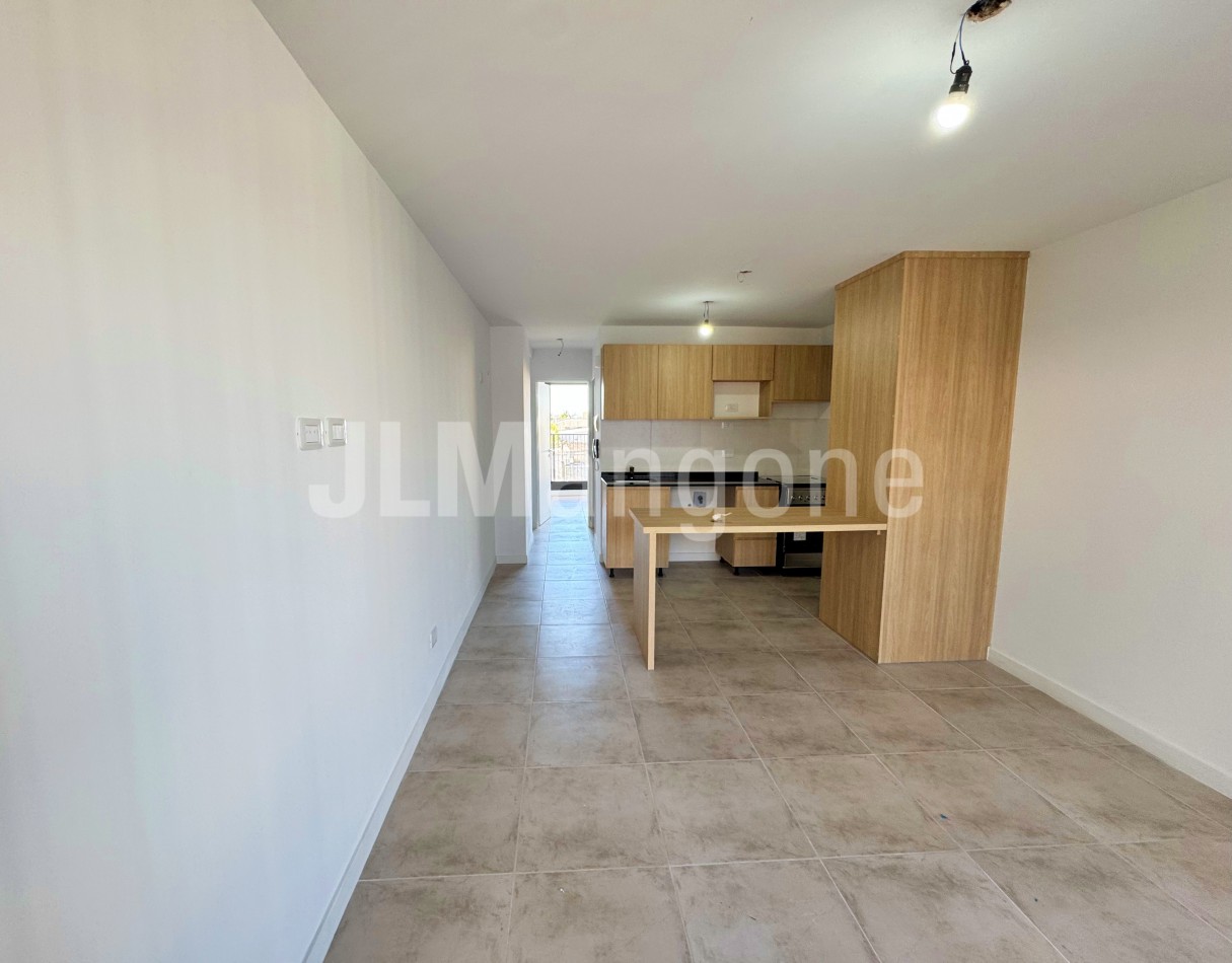 Departamento 2 ambientes con cochera y  balcon