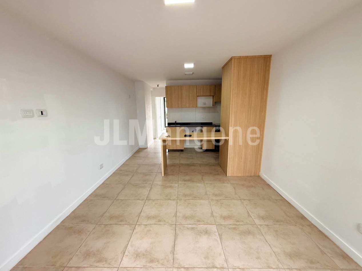 Departamento 2 ambientes con cochera y balcon