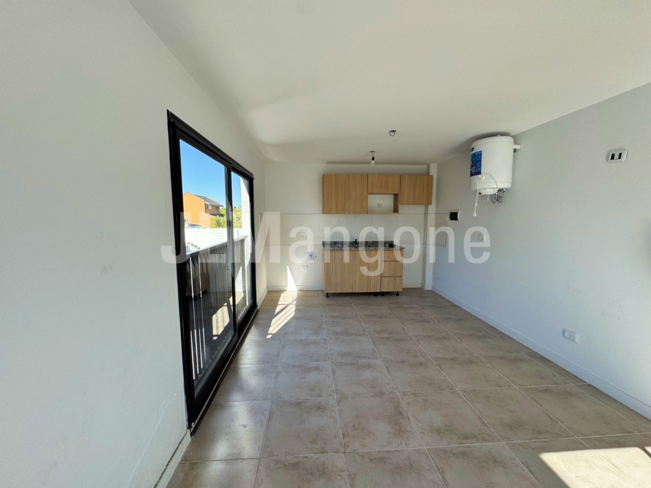 Departamento 2 ambientes con cochera y balcon