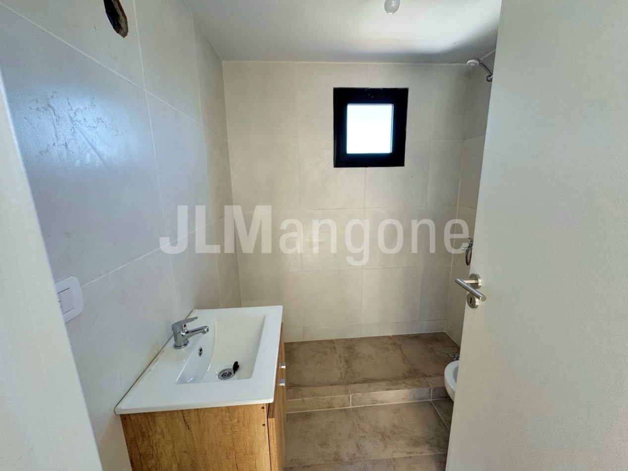 Departamento 2 ambientes con cochera y balcon