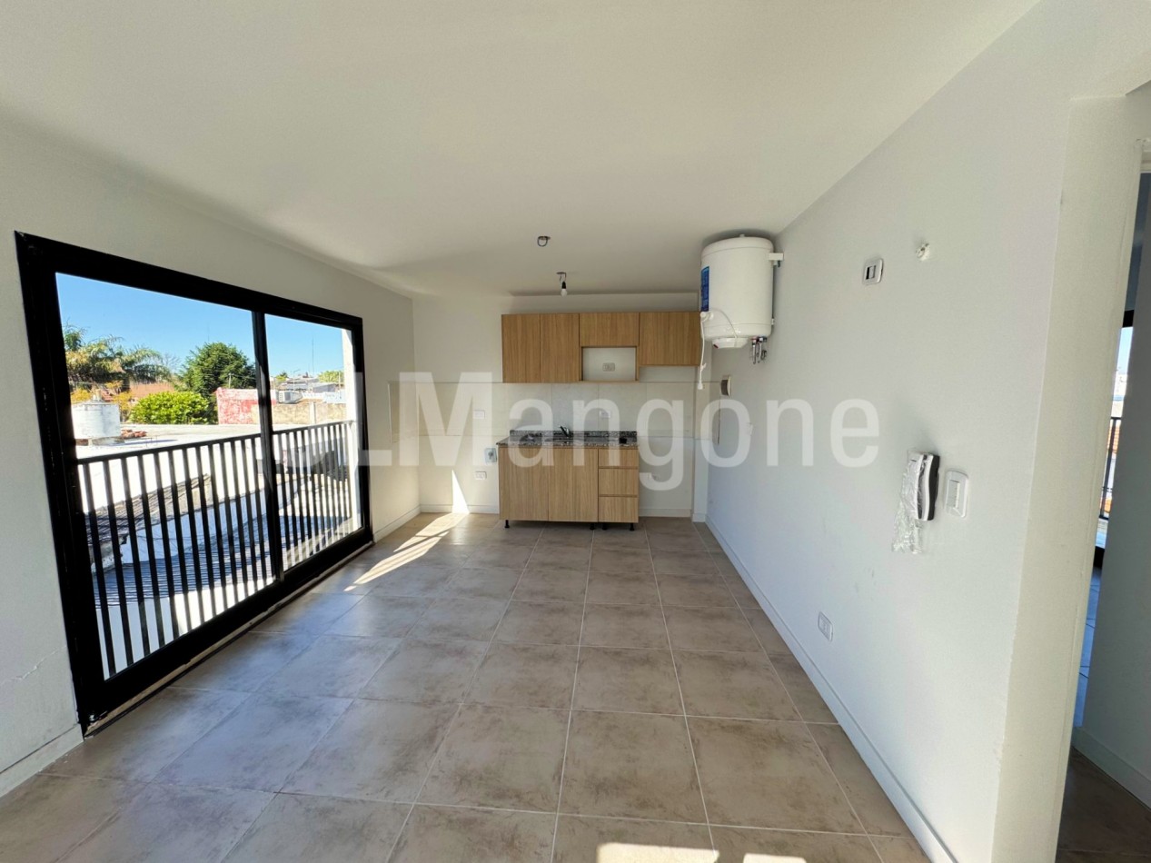 Departamento 2 ambientes con cochera y balcon